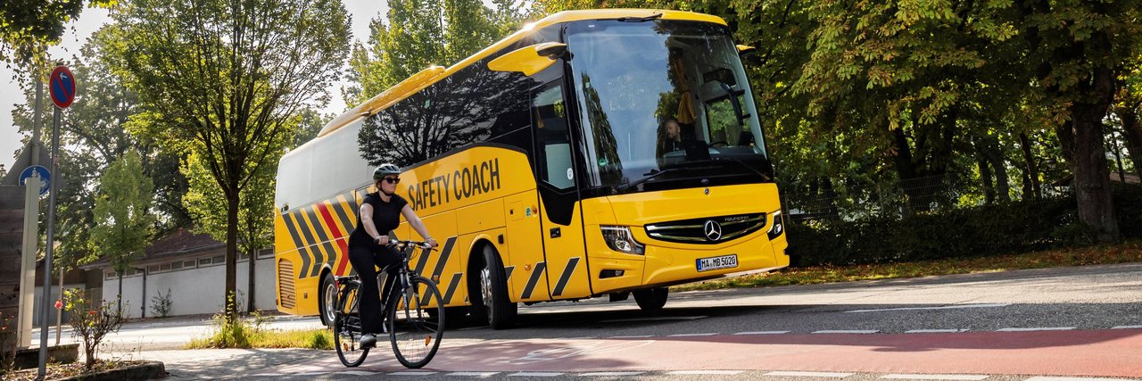 Mercedes-Benz Safety Coach with bike driver