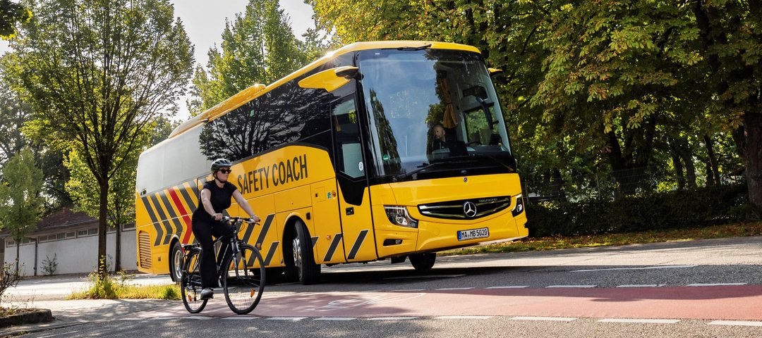 Mercedes-Benz Safety Coach with bike driver