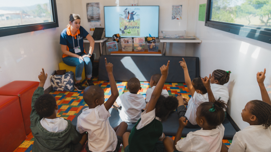 Pupils with their teacher in school